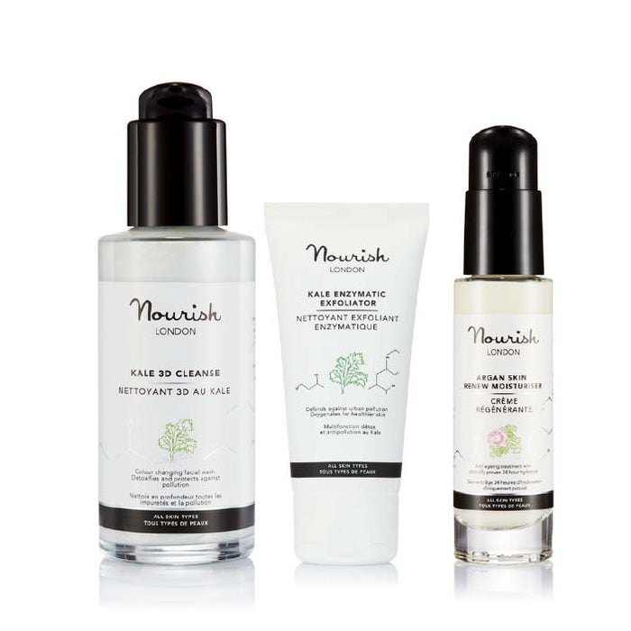 Three Nourish London skincare products displayed side by side: Kale 3D Cleanse cleanser, Kale Enzymatic Exfoliator, and Argan Skin Renew Moisturiser, shown against a white background