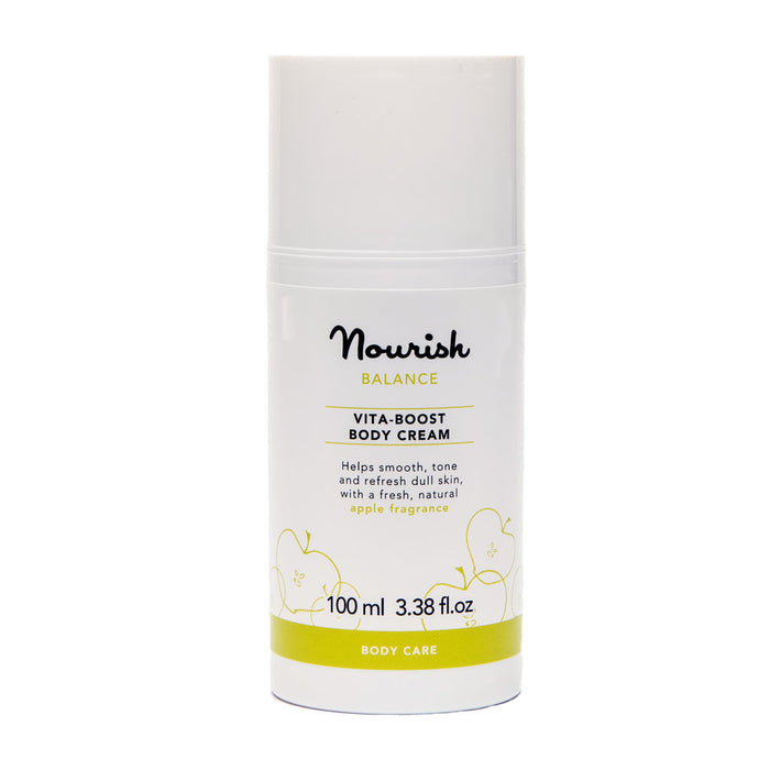 Nourish London Balance Vita-Boost Body Cream in a white pump bottle, 100 ml, with green accents and apple illustrations on a white background.