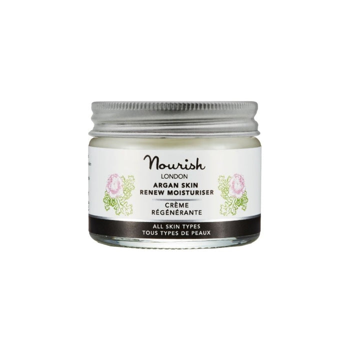 Nourish London Argan Skin Renew Moisturiser in a glass jar with silver lid, 15ml labelled ‘Crème Régénérante’, suitable for all skin types, on a white background